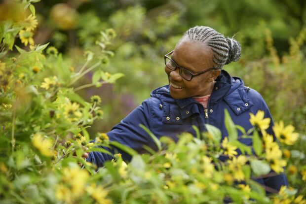 Woman looking at plants