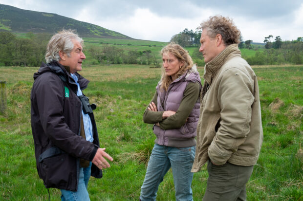 Tony Juniper stands with estate managers at Hepple Estate in Northumberland