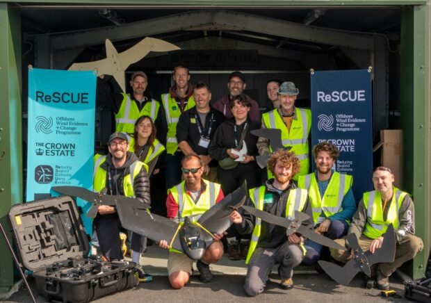 The ReSCUE field study team proudly show-off the bird-shaped targets and drones used in the study