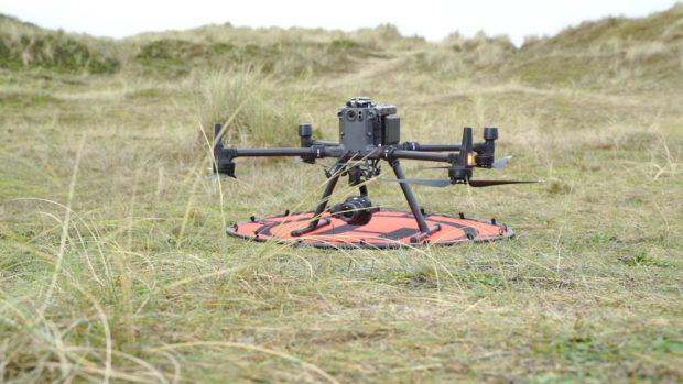 The drone about to take off from the dunes. © Aaron Good/Natural England.