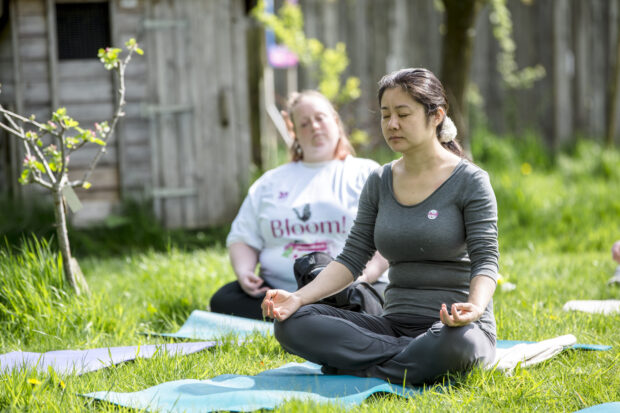 Yoga in the orchard at Quarry Bank, Cheshire © National Trust Images, Annapurna Mellor