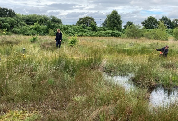 Natural England advisers taking peat samples out on site at Highfield Moss in Lancashire